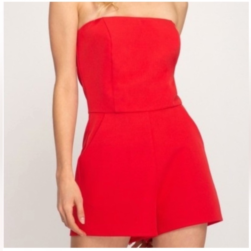 Red strapless romper with pockets
